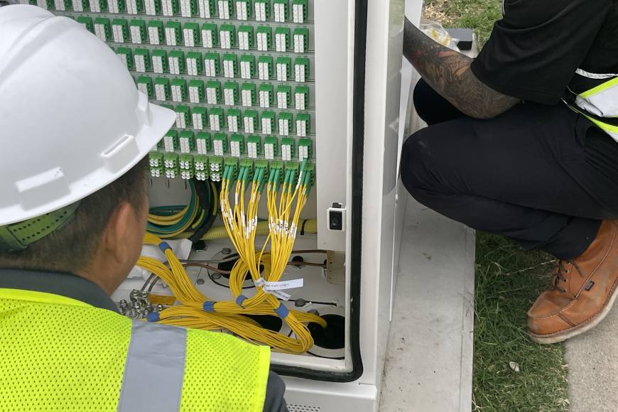 NetPMD team installing new network cabinets